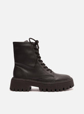 BOTA COTURNO PRETO CANO MÉDIO SOLA TRATORADA A 11843 0028 0001 AREZZO
