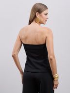 Blusa alfaiataria SKENN costas com estrutura elegante e acabamento fino