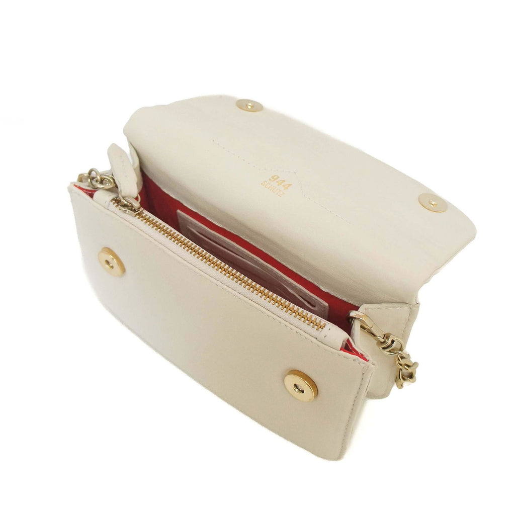 Bolsa Schutz 944 off-white aberta, mostrando forro vermelho, zíper dourado e fechos de botão