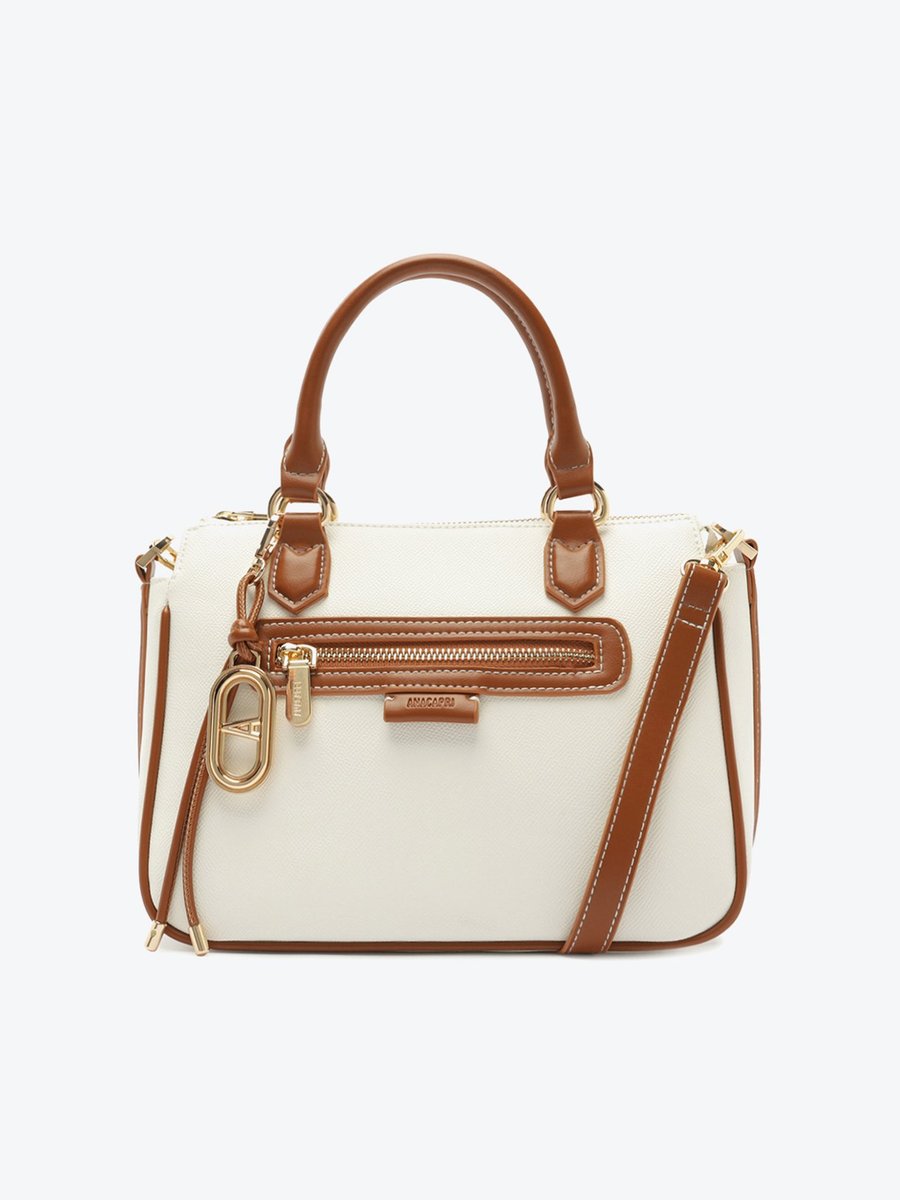 Bolsa tiracolo média Anacapri Charm Cadarço branca com alça de mão caramelo, zíper frontal e pingente dourado