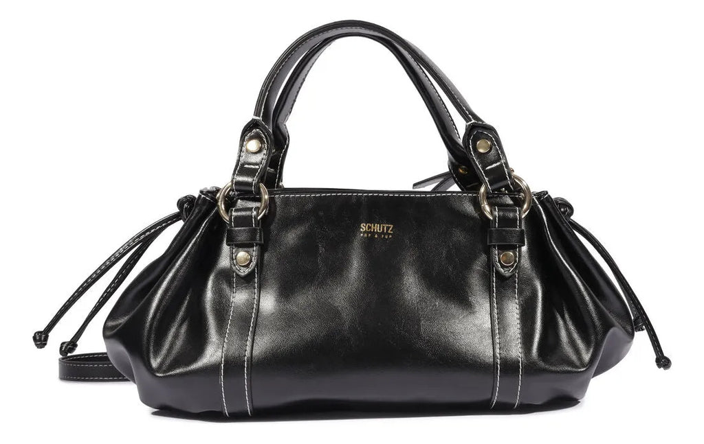 Bolsa Tote Pequena Schutz preta vista de frente, com costuras claras e cordões laterais ajustáveis