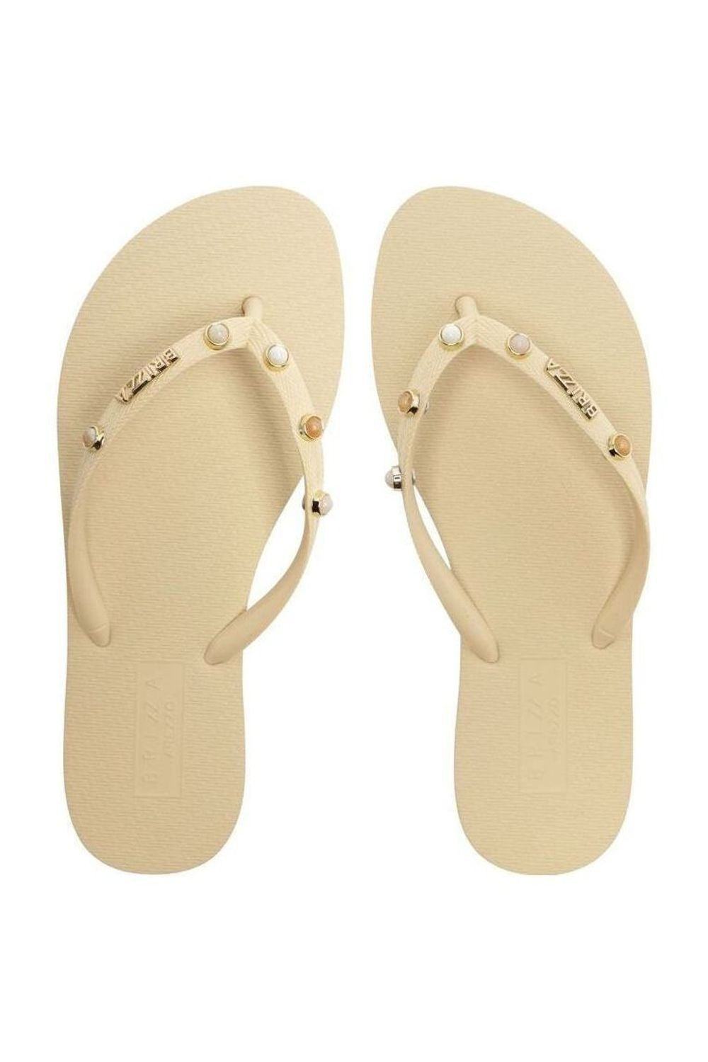 Chinelo Brizza Essential Pedras branco, par visto de frente com tiras cravejadas e logo dourado Imagem principal do produto