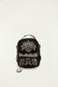 Mini mochila Farm Borogodó Coqueiro preta com bordado branco de palmeira e barrado floral, vista frontal